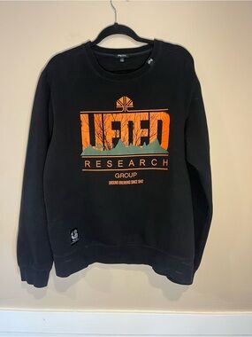 Lifted Research Group Black Crewneck Sweatshirt with Orange Graphic